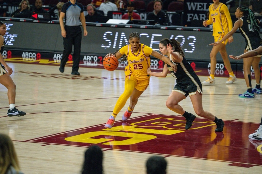 Kara Dunn drives to the basket against Purdue
