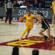 Kara Dunn drives to the basket against Purdue