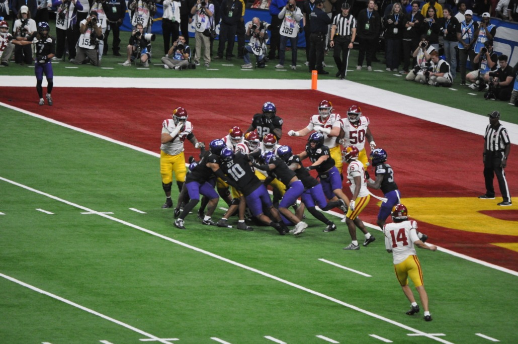 TCU holds USC football on a goal line attempt.