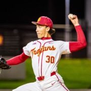 Junior pitcher Mason Edwards pitches