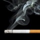 Cigarette with smoke coming out of it