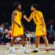 Ezra Ausar and Jacob Cofie celebrate