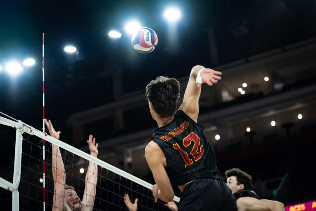 Sophomore outside hitter Sterling Foley goes to spike the ball