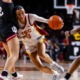 Freshman guard Jazzy Davidson drives to the basket