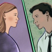 A professional-looking man and woman look at each other across a divide.