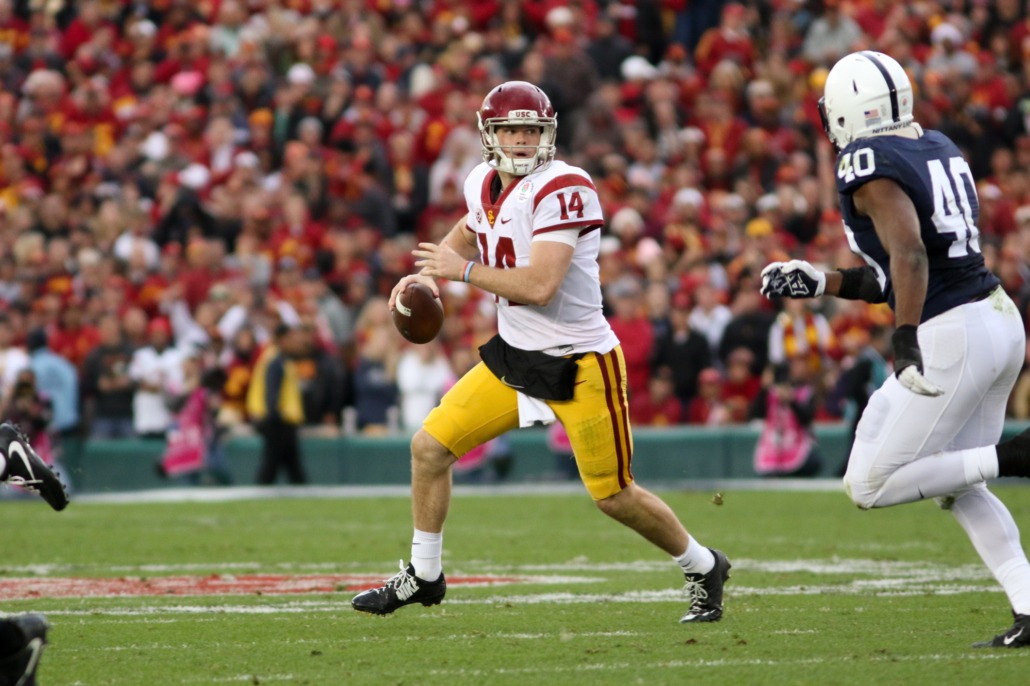 sam darnold looks downfield to pass the ball