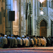 Muslim individuals pray.