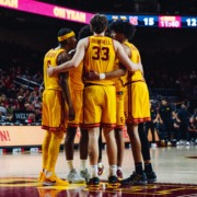 The team huddles after a play.
