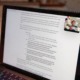 A photo of a computer with USG members meeting virtually