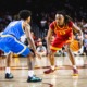 USC graduate guard Kam Woods stares down UCLA senior guard Donovan Dent