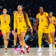 The USC women's basketball team walks across the court after a loss to South Carolina