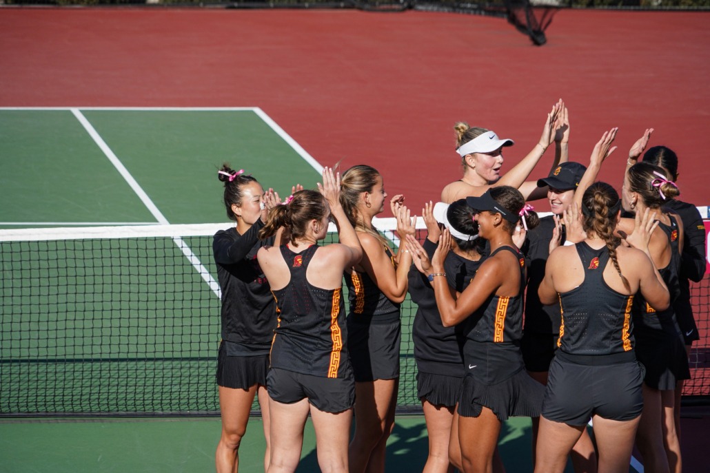Women's tennis team photographed after their match against UCSD