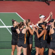 Women's tennis team photographed after their match against UCSD