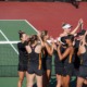 Women's tennis team photographed after their match against UCSD