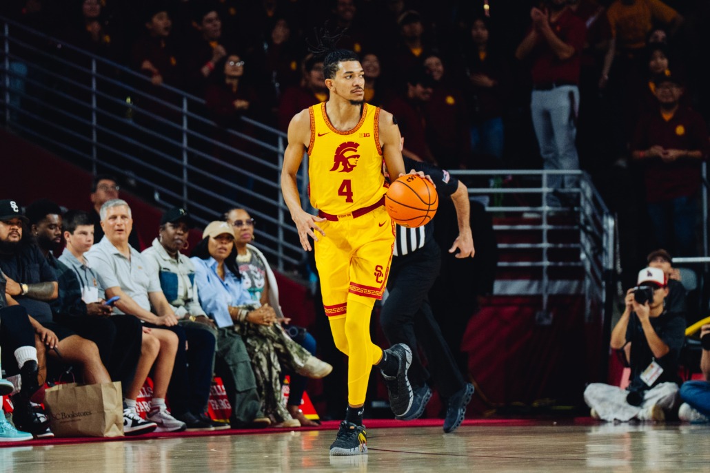 Chad Baker-Mazara dribbles the ball.