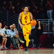 Chad Baker-Mazara dribbles the ball.