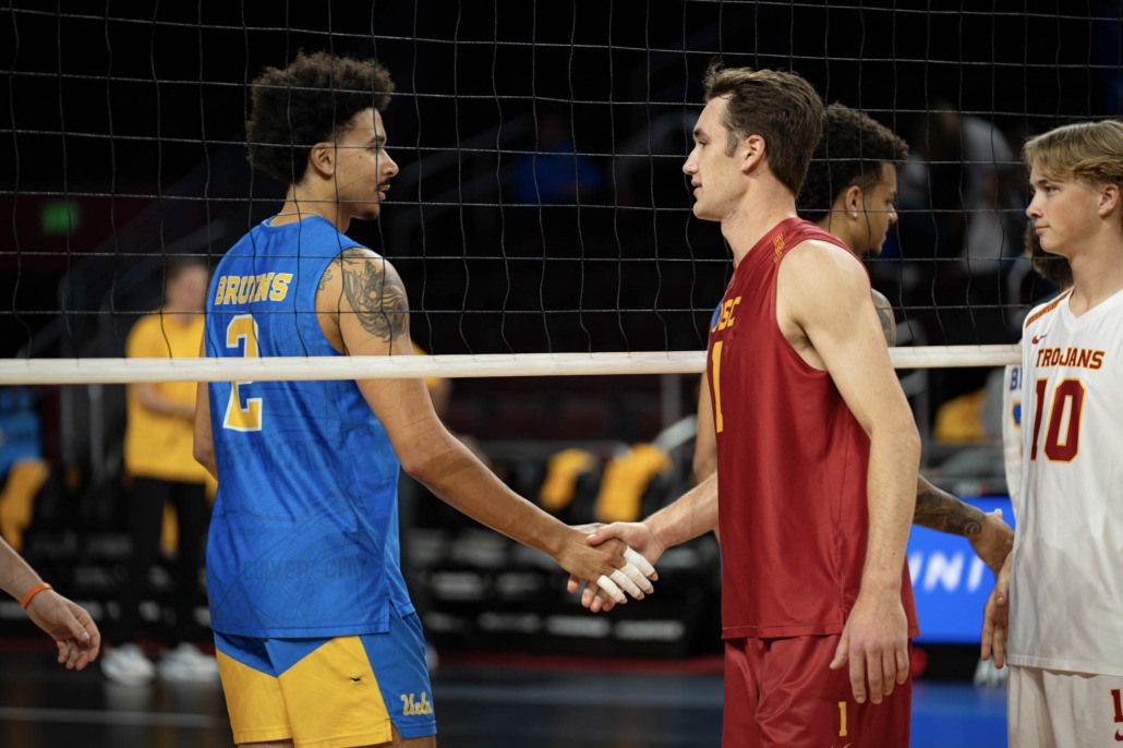 Dillon Klein and Jaidin Russell shake hands