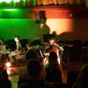 A cellist and a pianist perform at the showcase.