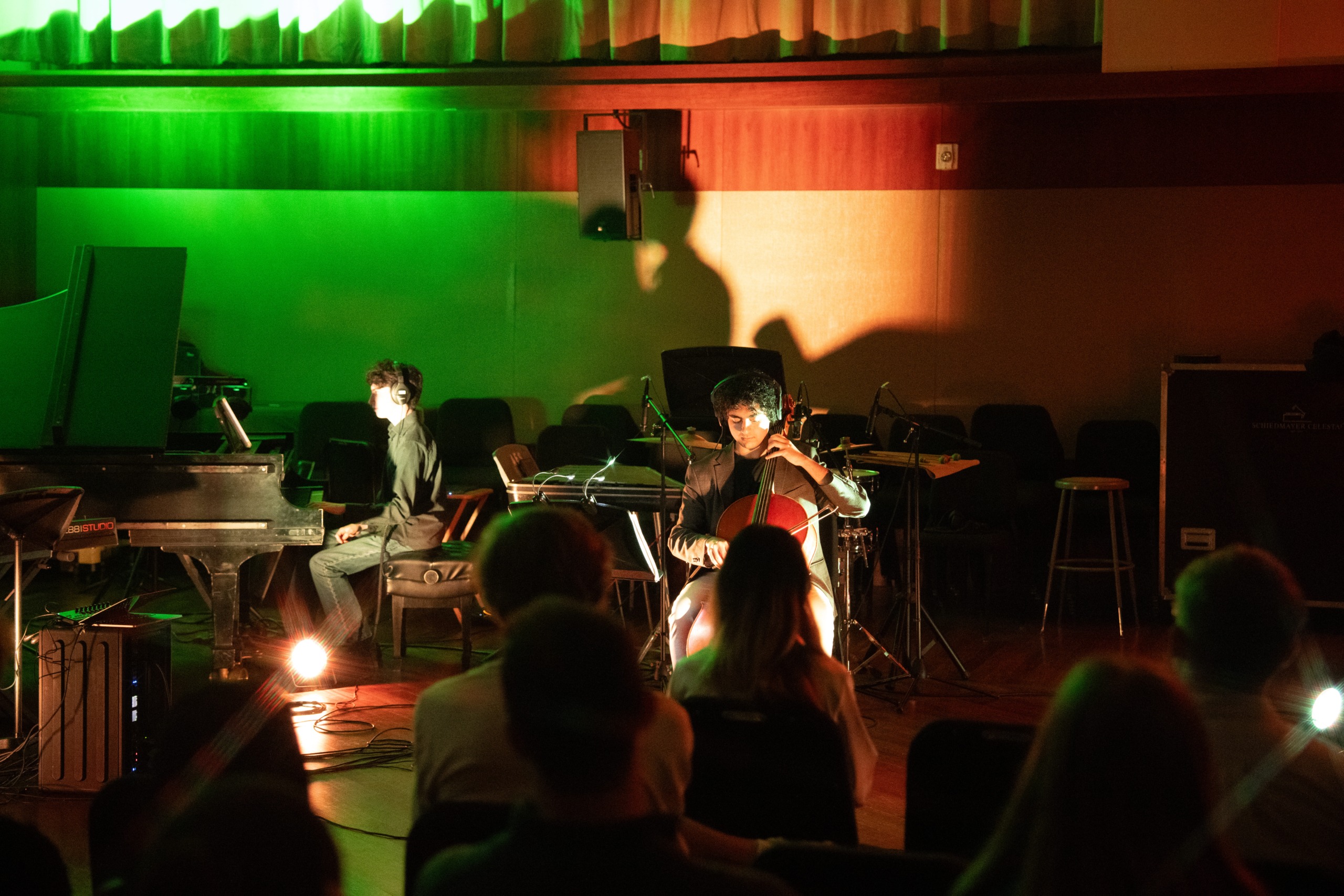 A cellist and a pianist perform at the showcase.