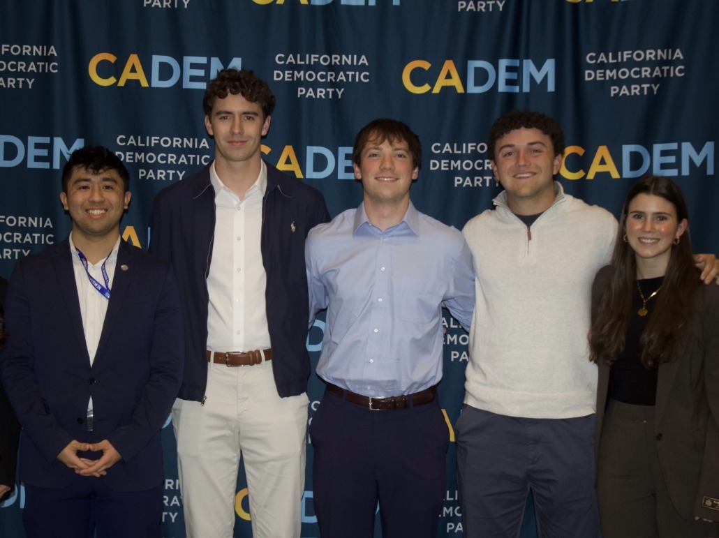 members of Coalition USC e-board pose for a photo at a conference