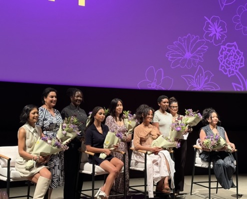 Women of "The Pitt" hold their flowers at the end of the panel.