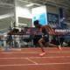 Senior sprinter Garrett Kaalund runs across the track