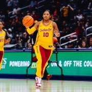 Malia Samuels dribbles down the court