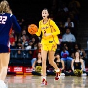 Freshman guard Jazzy Davidson dribbles the ball
