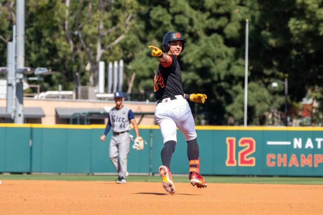 Augie Lopez rounds the bases after hitting a home run