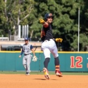 Augie Lopez rounds the bases after hitting a home run