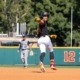 Augie Lopez rounds the bases after hitting a home run