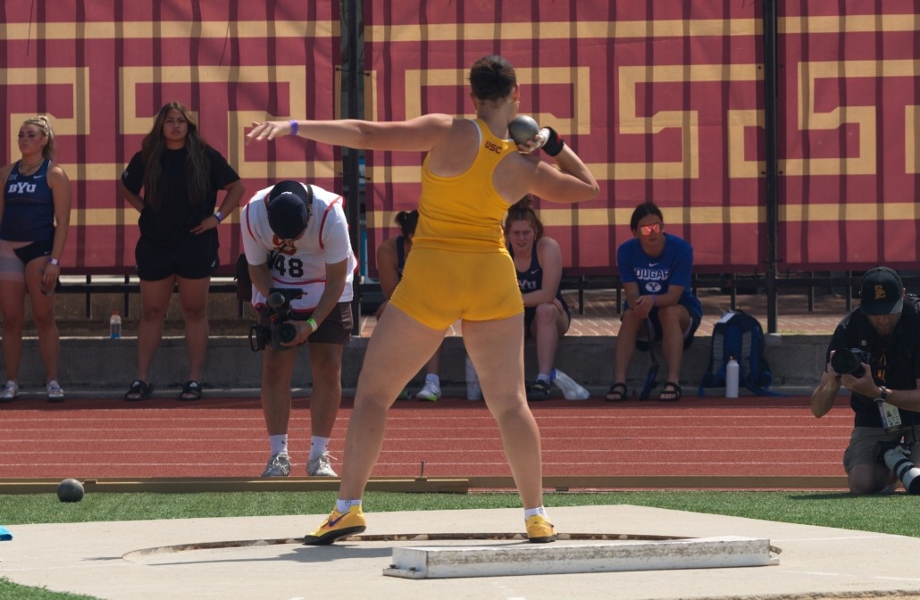 Sophomore thrower Ashley Erasmus throws the ball