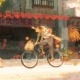 Roo, one of Zhang's characters, rides their bike through their hometown, which is inspired by Zhang's mother's hometown.