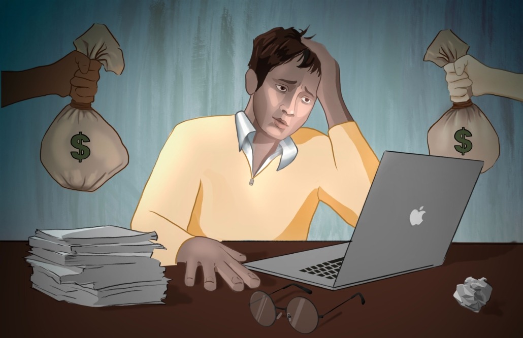A man in a yellow sweater next to a computer being stressed about money