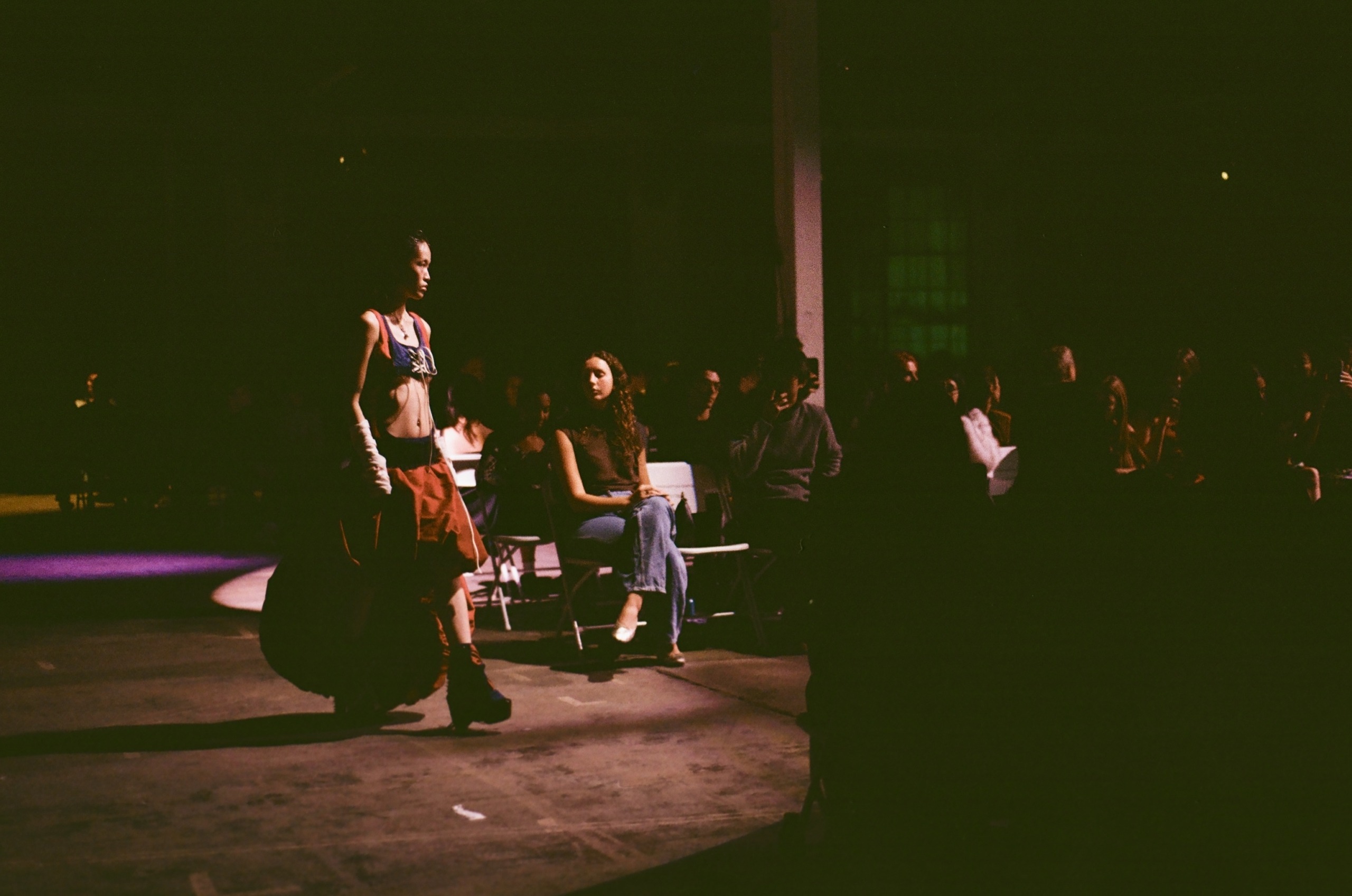 A model walks the runway at the FIA fashion show.