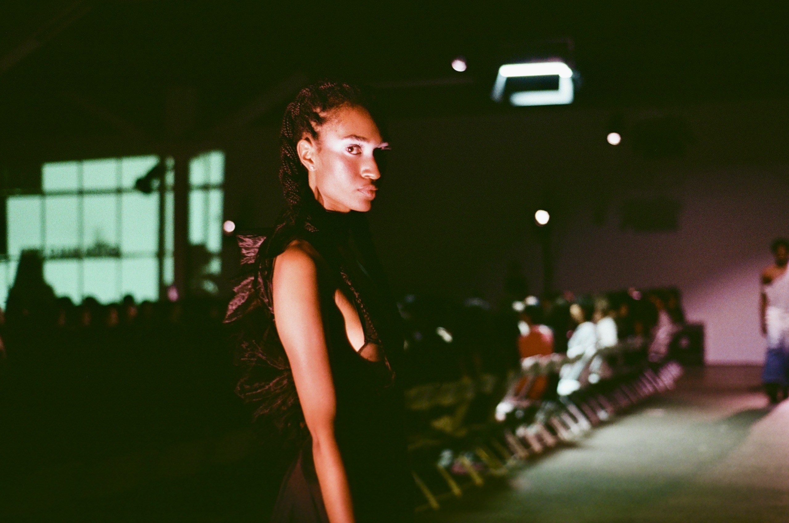 A model walks the runway at the FIA fashion show.