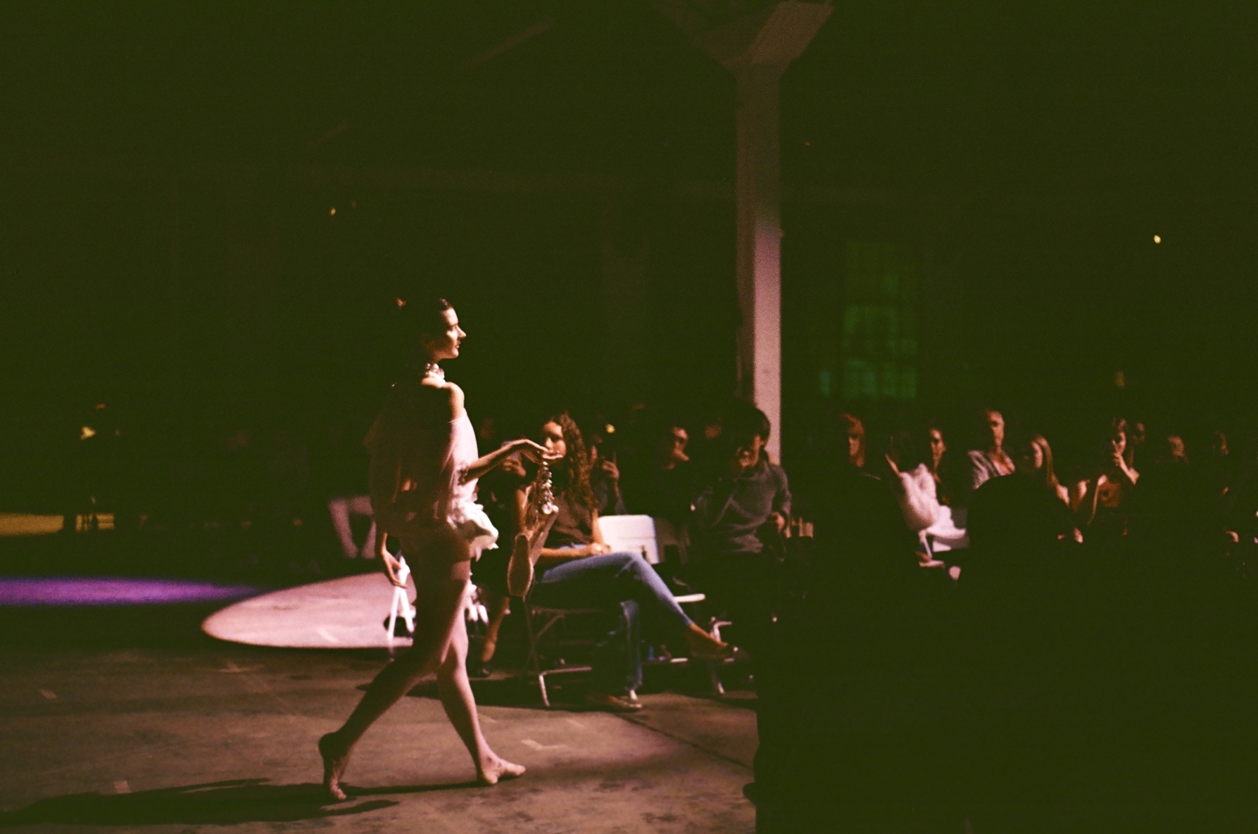 A model walks the runway at the FIA fashion show.