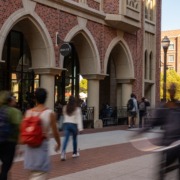 Image of students strolling around USC Village