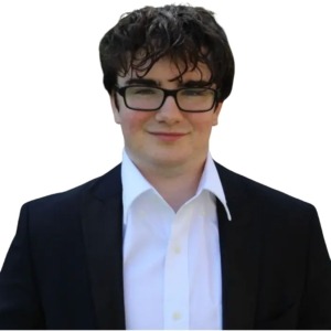 up close photo of zachary in suit and tie