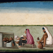 art of women making roti with mans help.