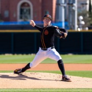 Andrew Johnson pitches the ball