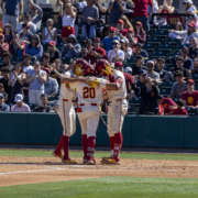 Isaac Cadena celebrates his two run homer with his teammates