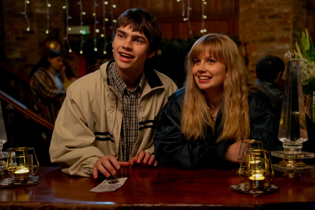 Raine and Owen smiling side-bye-side.