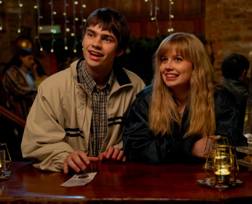 Raine and Owen smiling side-bye-side.